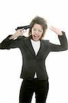 Businesswoman with messy hair and handgun over white studio background