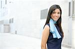 Beautiful blue dress stewardess walking to convention center