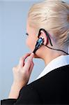 Young Business woman using a headset