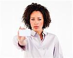 Beautiful Afro-American businesswoman holding white card and looking seriously at the camera
