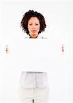 Serious Afro-American businesswoman with big white card in front of the camera
