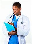 Handsome Afro-American doctor with a clipboard standing in front of the camera