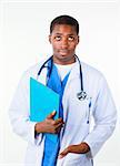 Confident Afro-American doctor holding a clipboard and looking at the camera