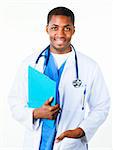 Happy Afro-American doctor holding a clipboard and looking at the camera