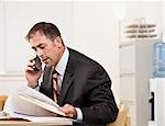 Businessman talking on telephone