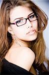 sensual young woman wearing glasses