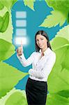 Brunette businesswoman touching virtual pad transparent key with finger