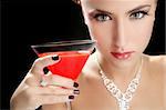 Attractive cocktail woman with jewellery and martini red glass