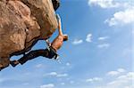 Rock climber Norbert climbing at the Windstein - Vosges - France.