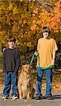 Boys Walking the Dog in the Fall