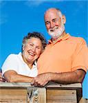 Portrait of beautiful, happy senior couple outdoors.