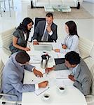 High angle of international businessteam working in a meeting