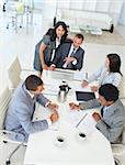 Multi-ethnic young businessteam working in a project in a meeting