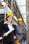 Portrait of construction worker and female architect. Copy space