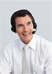 Portrait of a smiling mature man working in a call center