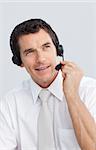 Portrait of a mature businessman working in a call center