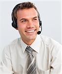 Portrait of an attractive young businessman with a headset on