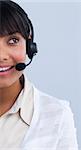 se-up of an attractive ethnic young businesswoman working in a call center
