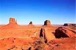 View of West Mitten Butte, East Mitten Butte, and Merrick Butte in Monument Valley.