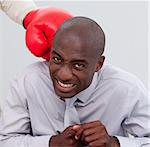 Portrait of an Afro-American businessman being boxed in the office