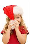 Little mischievous girl playing with christmas hat - isolated, closeup