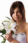 cute and young girl with white lily looking in camera with a smile