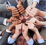 Multi-ethnic business people with thumbs up