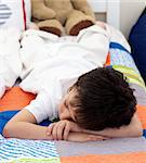 Cute Little boy sleeping in the bedroom