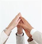 Close-up of hands up showing positivety isolated on a white background