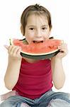 little girl eating watermelon isolated on white