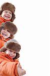 winter collage of happy 5 year old kids wearing the same brown hat and orange coat