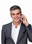 Smiling businessman on phone against a white background