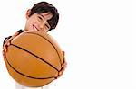 Boy with the ball, focus on ball on white isolated background