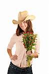 Pretty young brunette woman with cowboy hat and flowers