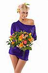 stunning blond woman wearing a violet dress with flower on head and a bouquet