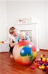 Lovely boy playing with his mother