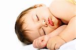 Adorable sleeping baby. Isolated on white background.