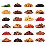 Large collection of dried and candied fruit for snacks and culinary use, isolated over white background.