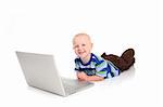 Excited Little Boy Learning to Use a Laptop Computer on White Background