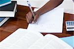 Close-up of an Afro-American girl doing her homework at home