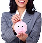 Focus on a piggybank against a white background