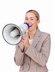 Laughing businesswoman shouting through a megaphone isolated on a white background