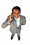 Positive ethnic businessman on phone isolated on a white background