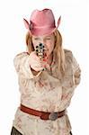 Woman with pink cowboy hat pointing a loaded pistol