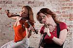 Two female musicians with violin and vocals