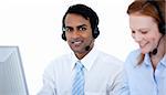 Self-assured sales representative partners with a headsets against white background