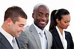 Self-assured multi-ethnic business people in a meeting against a white background