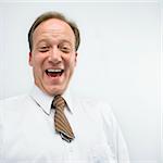 Caucasian middle aged businessman portrait with cut necktie.