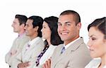 Charming businessman and his team lining up against a white background