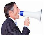 Businessman shouting instructions through a megaphone isolated on a white background